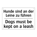 Hunde sind an der Leine zu führen/.../ - Dogs must be kept on a leash