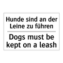 Hunde sind an der Leine zu führen/.../ - Dogs must be kept on a leash