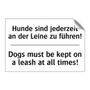 Hunde sind jederzeit an der Leine /.../ - Dogs must be kept on a leash at /.../