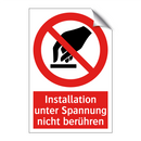Installation unter Spannung nicht berühren