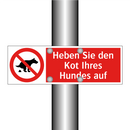 Heben Sie den Kot Ihres Hundes auf