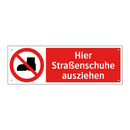 Hier Straßenschuhe ausziehen