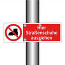 Hier Straßenschuhe ausziehen