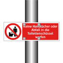 Keine Handtücher oder Abfall in die Toilettenschüssel werfen
