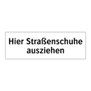 Hier Straßenschuhe ausziehen