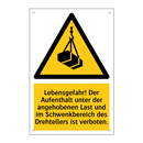 Lebensgefahr! Der Aufenthalt unter der angehobenen Last und im Schwenkbereich des Drehtellers ist verboten.