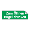Zum Öffnen Bügel drücken