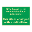 Diese Anlage ist mit einem Defibrillator /.../ - This site is equipped with a defibrillator /.../