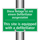 Diese Anlage ist mit einem Defibrillator /.../ - This site is equipped with a defibrillator /.../