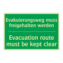 Evakuierungsweg muss freigehalten /.../ - Evacuation route must be kept /.../