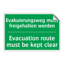 Evakuierungsweg muss freigehalten /.../ - Evacuation route must be kept /.../