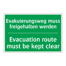 Evakuierungsweg muss freigehalten /.../ - Evacuation route must be kept /.../