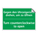 Gegen den Uhrzeigersinn drehen, /.../ - Turn counterclockwise to open