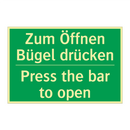 Zum Öffnen Bügel drücken - Press the bar to open