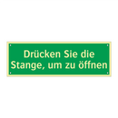 Drücken Sie die Stange, um zu öffnen