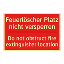 Feuerlöscher Platz nicht versperren/.../ - Do not obstruct fire extinguisher /.../
