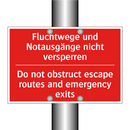 Fluchtwege und Notausgänge nicht /.../ - Do not obstruct escape routes /.../