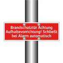 Brandschutztür Achtung Aufhaltevorrichtung! Schließt bei Alarm automatisch