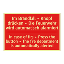 Im Brandfall • Knopf drücken • /.../ - In case of fire • Press the button /.../