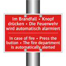 Im Brandfall • Knopf drücken • /.../ - In case of fire • Press the button /.../