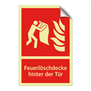 Feuerlöschdecke hinter der Tür