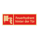 Feuerhydrant hinter der Tür