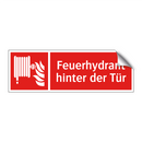 Feuerhydrant hinter der Tür
