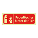 Feuerlöscher hinter der Tür