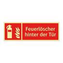 Feuerlöscher hinter der Tür