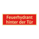 Feuerhydrant hinter der Tür