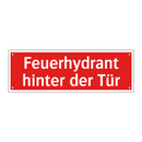 Feuerhydrant hinter der Tür