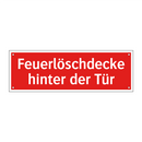 Feuerlöschdecke hinter der Tür