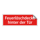 Feuerlöschdecke hinter der Tür