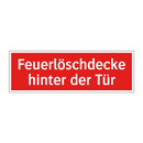 Feuerlöschdecke hinter der Tür