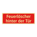 Feuerlöscher hinter der Tür