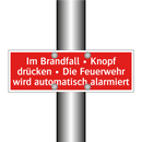 Im Brandfall • Knopf drücken • Die Feuerwehr wird automatisch alarmiert