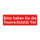 Bitte halten Sie die Feuerschutztür frei