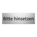 Bitte hinsetzen