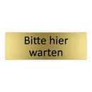 Bitte hier warten