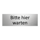 Bitte hier warten