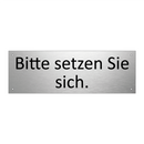 Bitte setzen Sie sich.