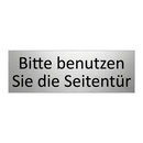 Bitte benutzen Sie die Seitentür