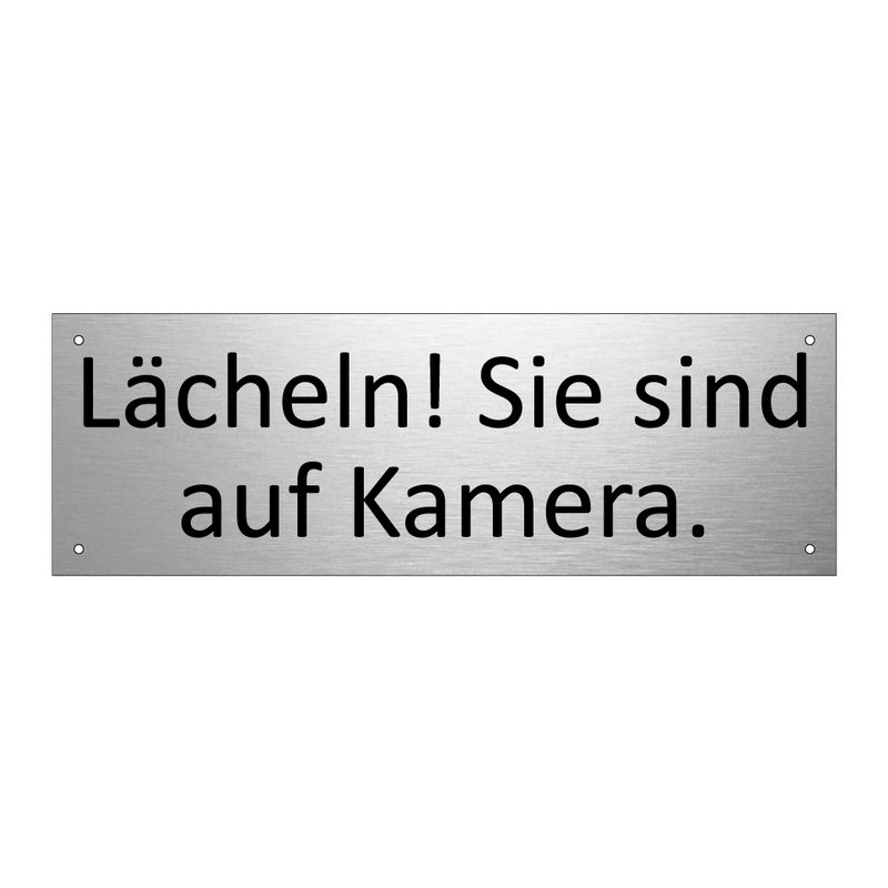 Lächeln! Sie sind auf Kamera.