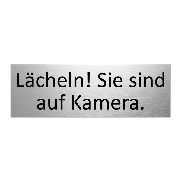 Lächeln! Sie sind auf Kamera.