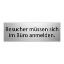 Besucher müssen sich im Büro anmelden.