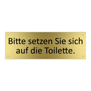 Bitte setzen Sie sich auf die Toilette.