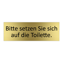 Bitte setzen Sie sich auf die Toilette.