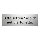 Bitte setzen Sie sich auf die Toilette.