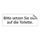 Bitte setzen Sie sich auf die Toilette.