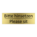 Bitte hinsetzen - Please sit